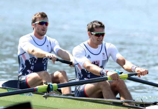 Alan Sinclair (left) rows with Stewart Innes at the 2016 Olympics.