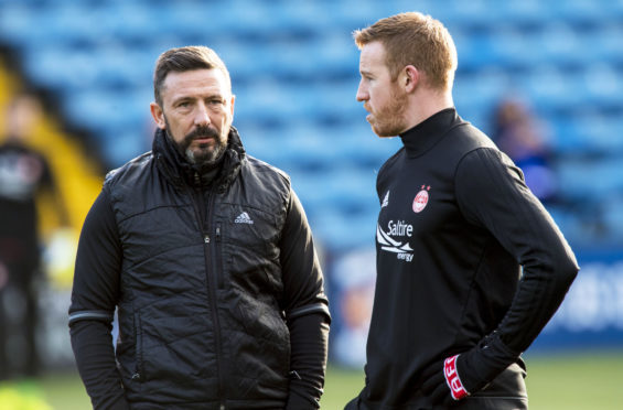 Derek McInnes and former Dons hitman Adam Rooney.