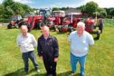 Charlie Cruikshank, Doug Nicol and Bill Stewart with some of the tractors heading to the show.