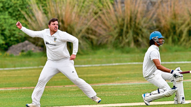 cricket ; 
Aberdeenshire v Carlton at Mannofield.    
Pictured - Shire's captain Chris Venske celebrates a wicket also pictured Carlton batsman Arun Pillai.     
Picture by Kami Thomson    09-06-18