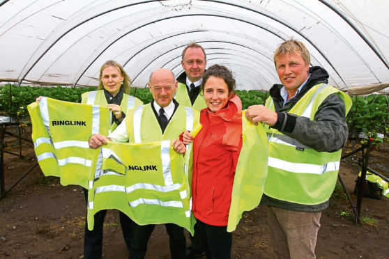 From left to right: Ringlink's Gail Robertson, Graham Bruce and Peter Wood with Rural Minister Mairi Gougeon and James Porter of East Scryne Fruit Farm.