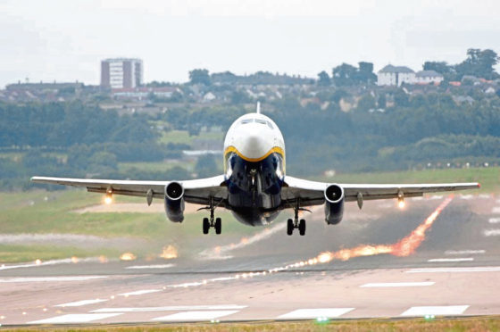 Aberdeen Airport, aircraft taking off.