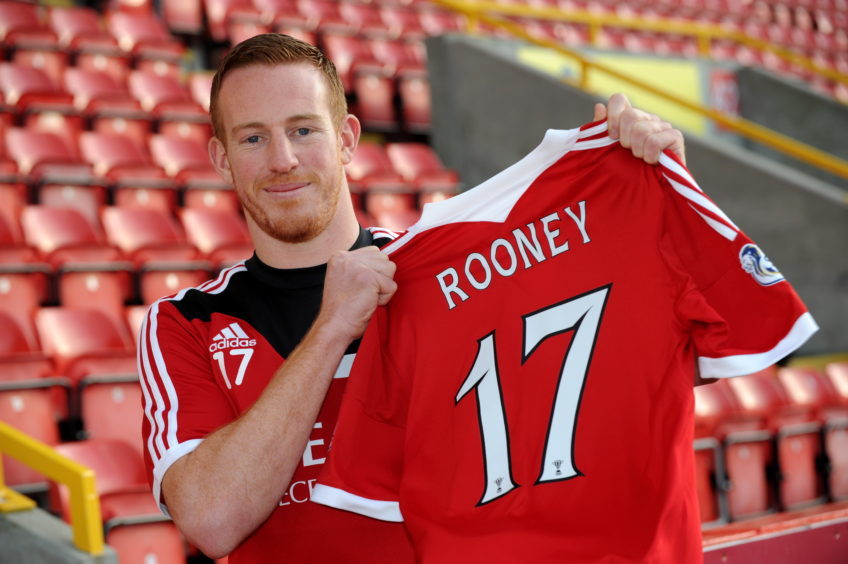 Adam Rooney is paraded as a new signing on January 23, 2014. Picture by Kenny Elrick