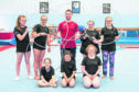 Olympic gymnast, Dan Purvis (centre top) with gymnasts at the Aberdeen Disability Gymnastics Training Camp last weekend.