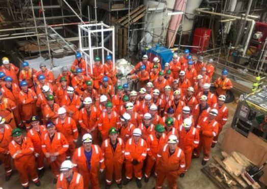 Workers on the Mariner platform last week.