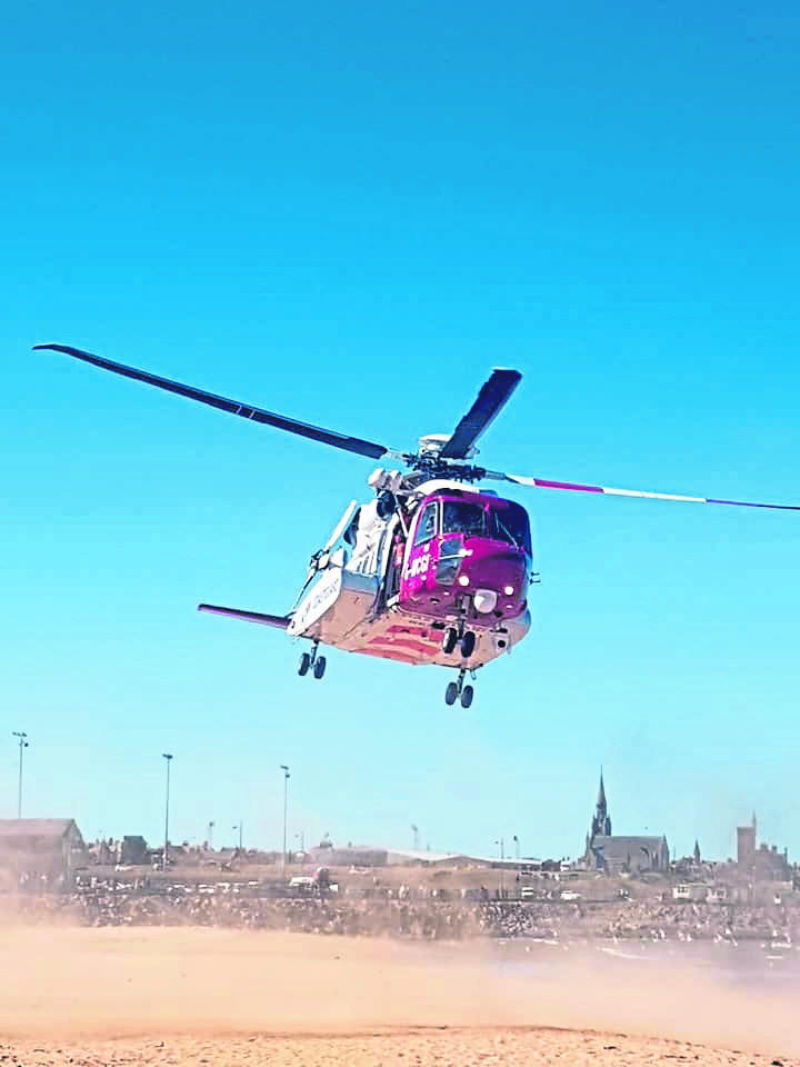 A Coastguard helicopter attended Fraserburgh beach on Saturday after reports of persons coming into difficulty while in the sea.
Picture: HM Coastguard