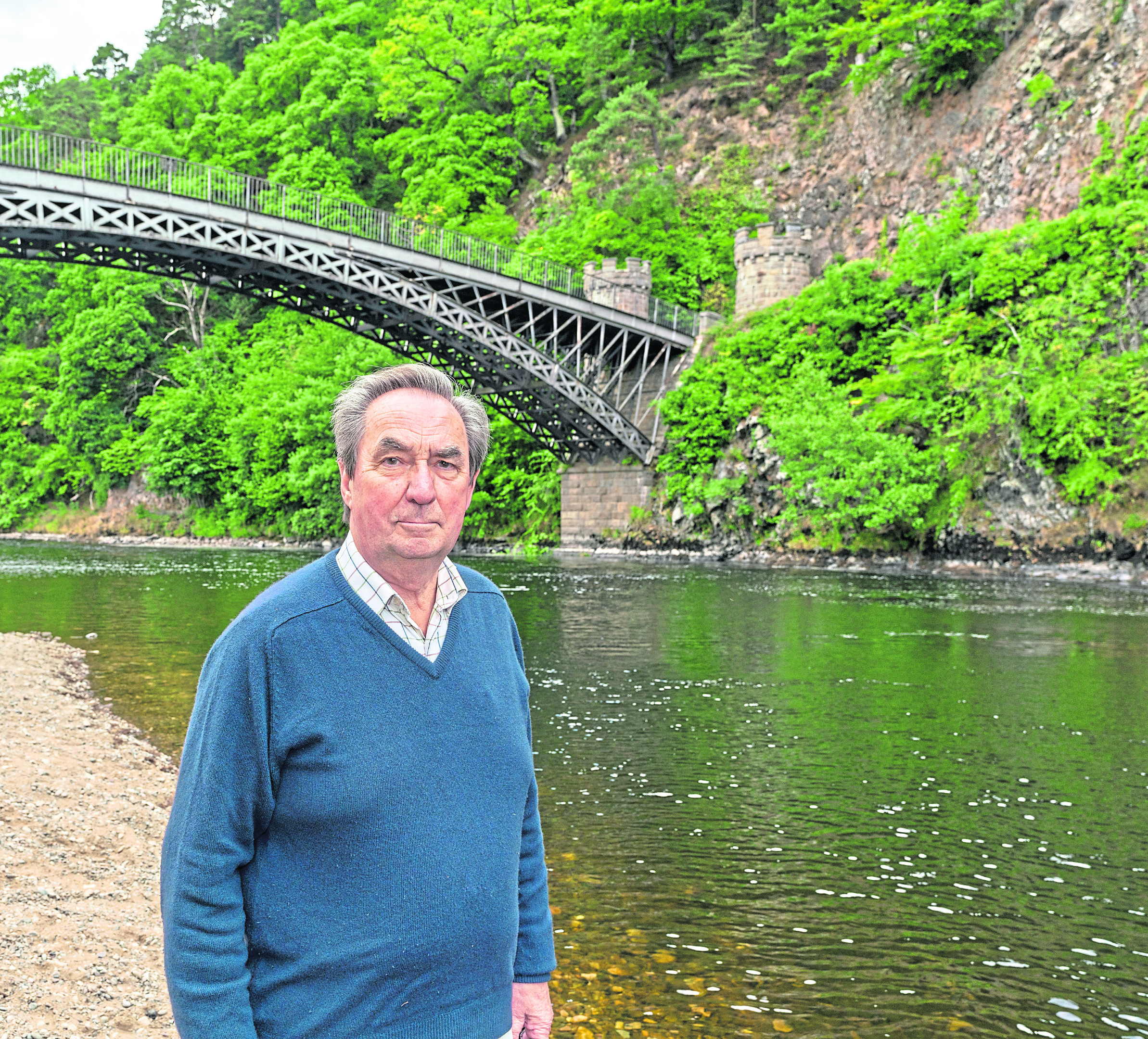 Brian Doran, chairman of the Spey Fishery Board on the banks of the River Spey at Craigellachie Bridge