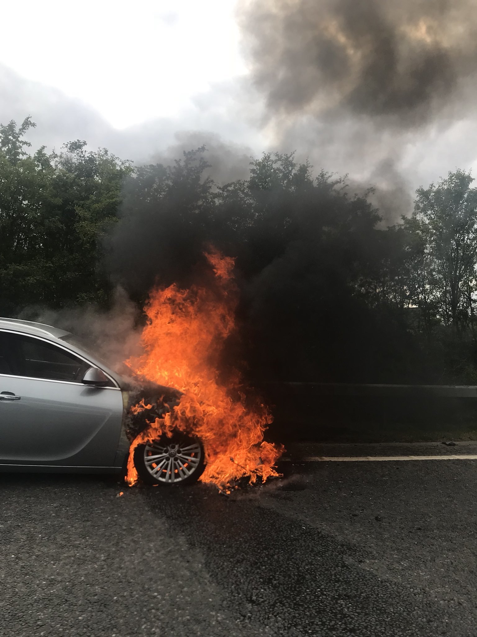 Car on fire on the A96. Picture taken by Jim Duff.