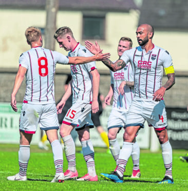 Ross County in action against Nairn County on Saturday.