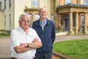 Friends of Grant Lodge, committee members John Valckhal and Stewart Halkett outside the building.