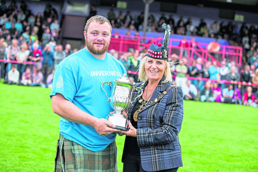 Inverness Highland Games 2018.

The annual games draws a large crowd with many overseas visitors watching and taking part in the games.

James Gann wins the overall heavy champion trophy, presented by Inverness Provost Helen Carmichael.