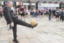 Lord Provost Barney Crockett showed off his keepie-uppie skills to travelling Burnley fans waiting for the Clarets' Europa League clash with Aberdeen.