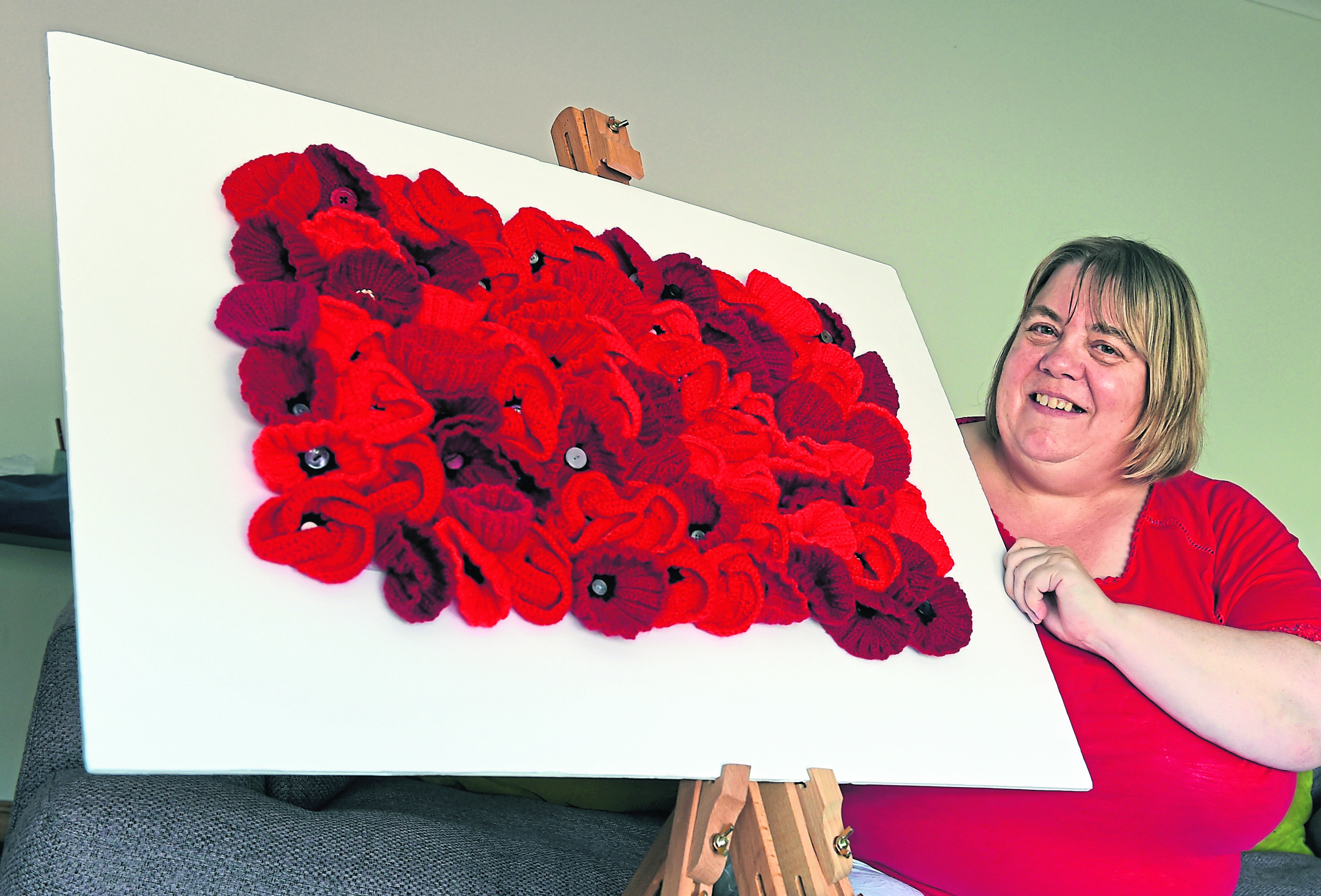 Nancy Duncan, Peterhead, celebrating 100 years of the WW1 anniversary by creating and collecting 10,000 knitted poppies
