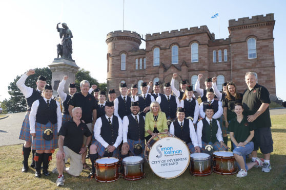 City of Inverness Pipe Band with LCC staff and Provost Helen Carmichael.