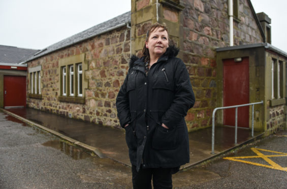 Picture by JASON HEDGES    

Pictures show Councillor Sonya Warren outside of Findochty town hall.