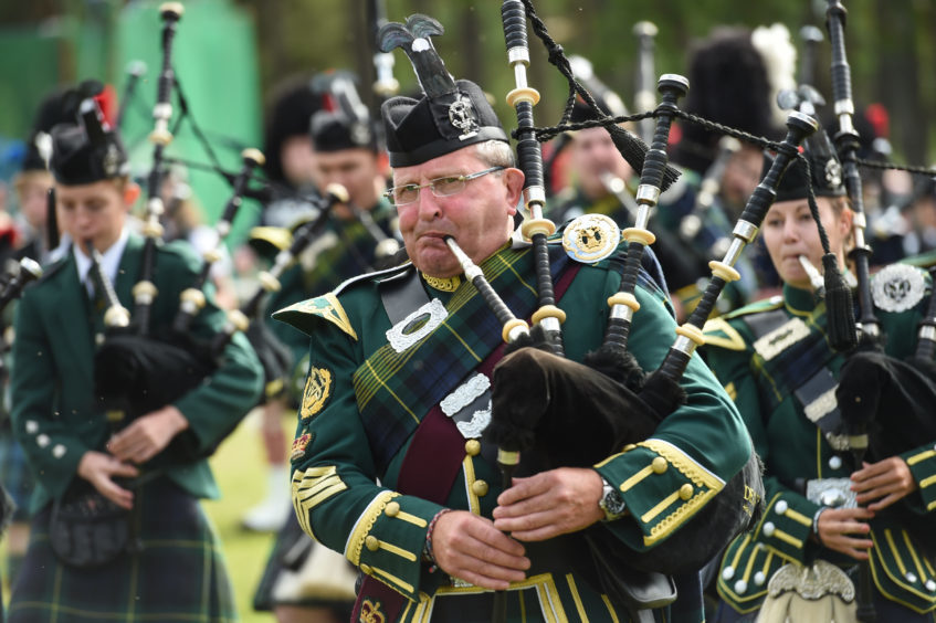 Picture by JASON HEDGES 

Pictures show the sporting events of Tomintoul, 2018 Highland Games.

Picture: Pipe Bands Perform