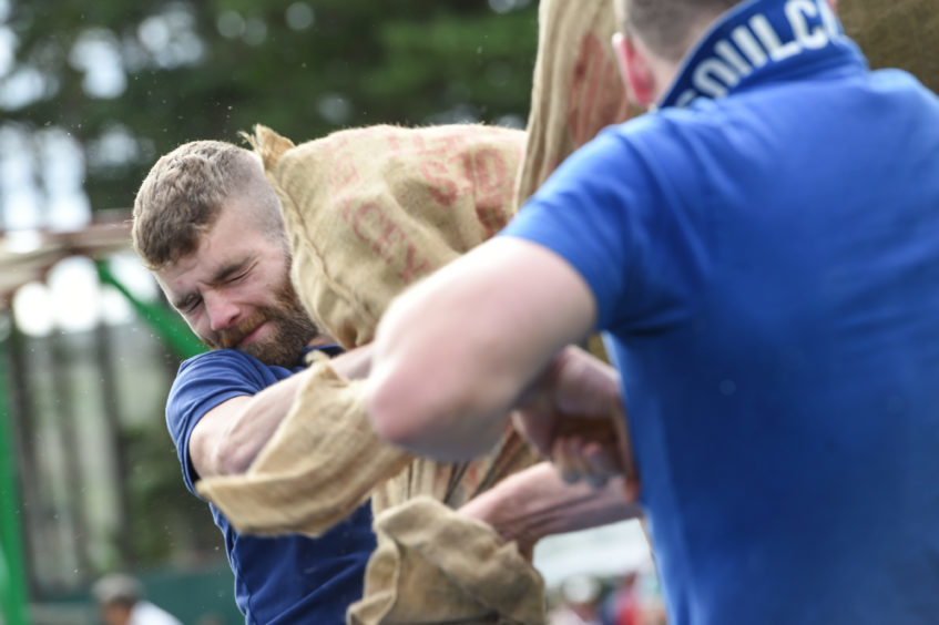Picture by JASON HEDGES 

Pictures show the sporting events of Tomintoul, 2018 Highland Games.

Picture: Competitors fight it out in the Pillow Fight.
