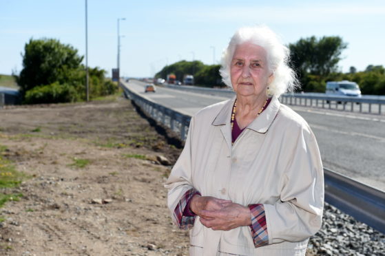 Edna Booth, who is furious about the only bus stop at Blackdog being taken away as part of the AWPR works. 
Picture by Kenny Elrick