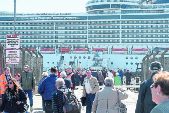 The harbour’s expansion could allow ships like the Caribbean Princess, pictured in Invergordon, to disembark her passengers at the quayside