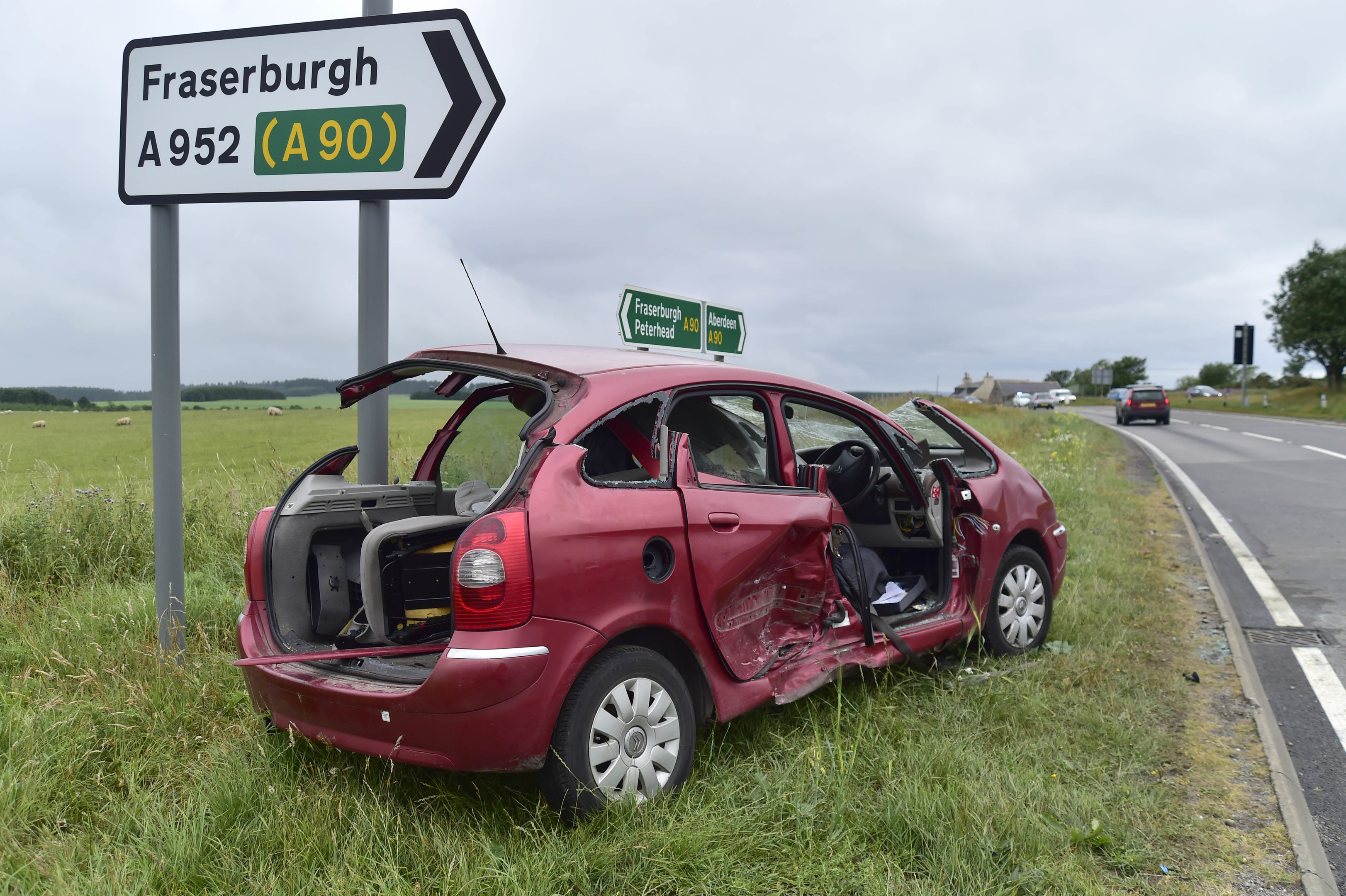 One of the vehicles involved in a two-car crash at the Toll of Birness on the A90 Aberdeen to Peterhead road
