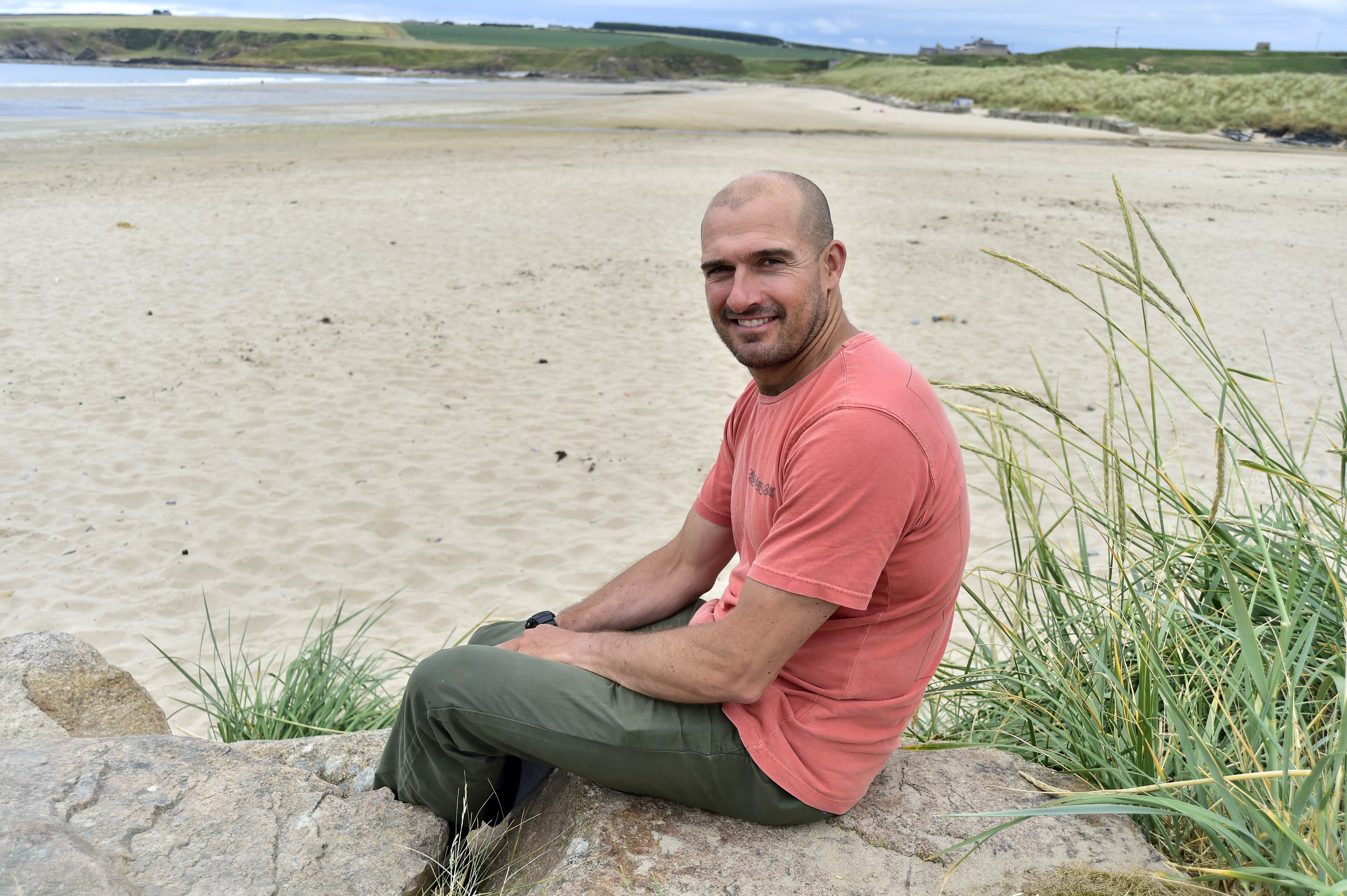 Sandend community organiser Craig Sullivan is delighted that running power cables over the beach for the Moray West Windfarm is not now going to happen.