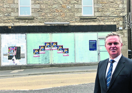 Colin Clark outside Ellon RBS which has been described as a "war zone".