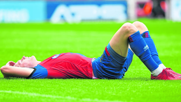 Inverness Coll Donaldson dejected at the end of the match