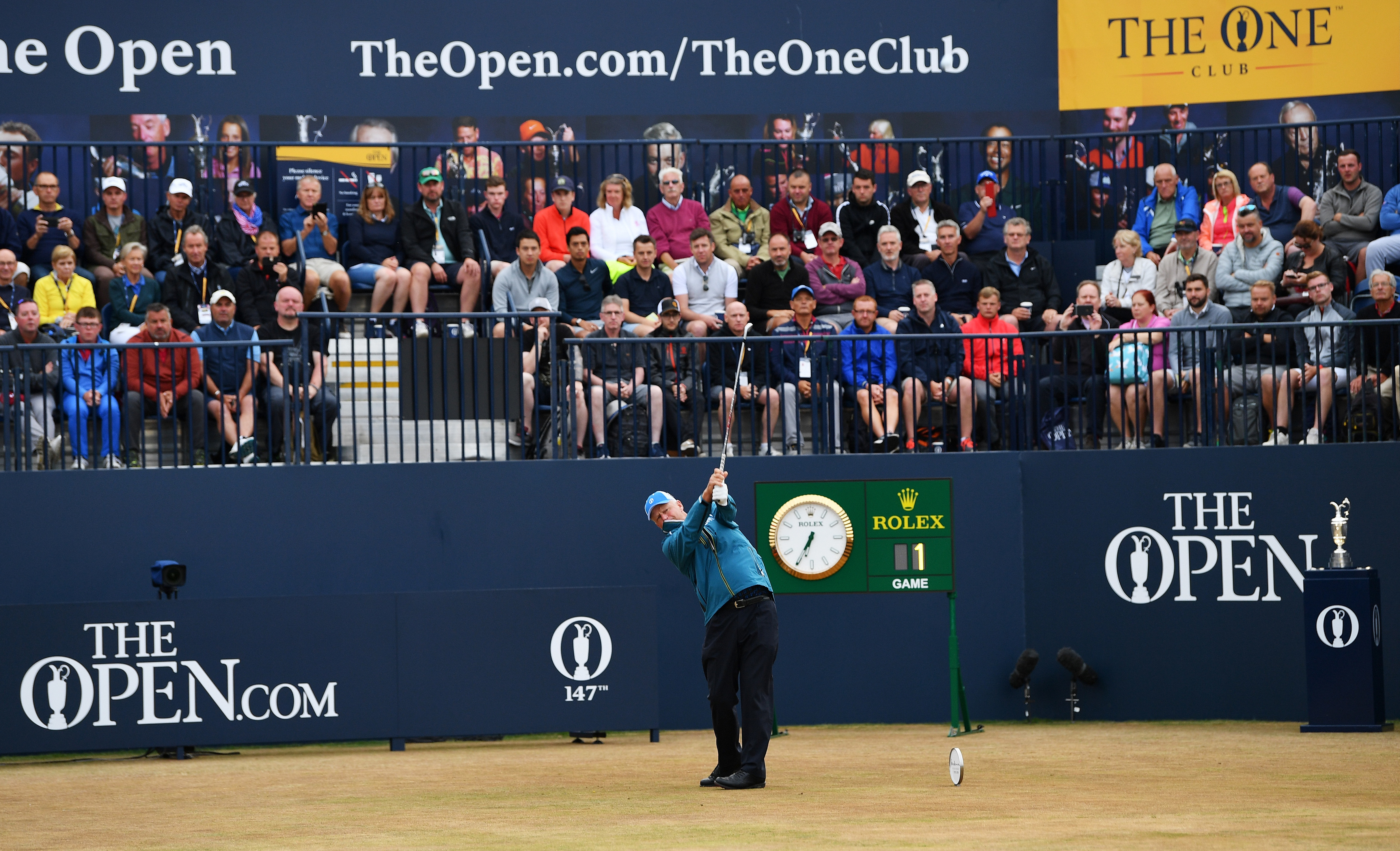 Sandy Lyle hits the opening shot during the first round of the 147th Open championship.