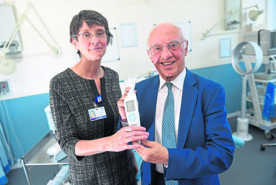 Pictured from left, Professor Maggie Cruickshank and Willie Henderson with the ZedScan diagnostic devices. 
Picture by Darrell Benns