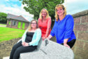 Sinead McKenzie, Councillor Dianne Beagrie and Beth Buchan from Sands at the new bench in Peterhead.