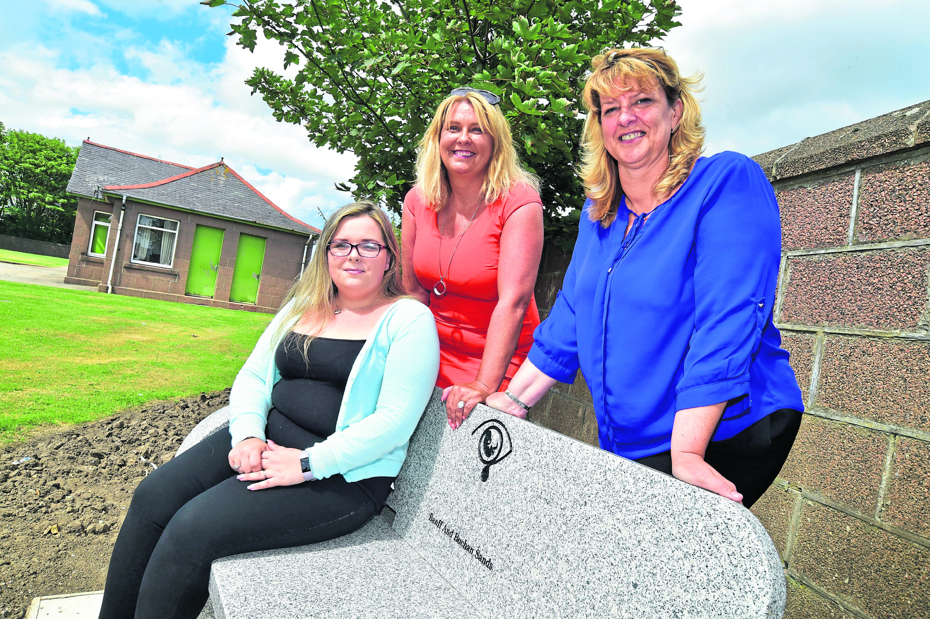 Sinead McKenzie, Councillor Dianne Beagrie and Beth Buchan from Sands at the new bench in Peterhead.