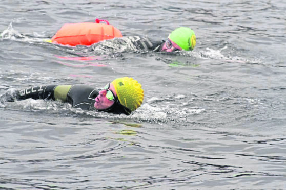 Colleen Blair, 39, from Perth, Colin Macleod 46, from Stornoway and Norman Todd, 46 were aiming to swim across the Minch.