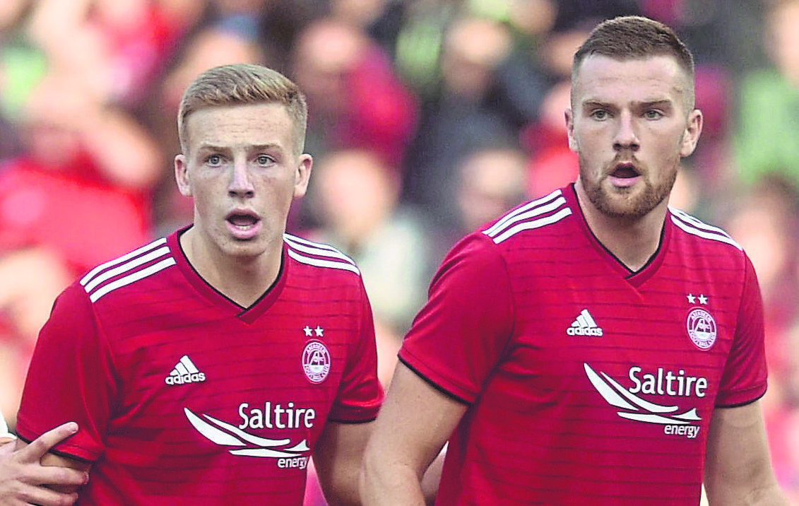 Michael Devlin, right, was sent-off for Aberdeen