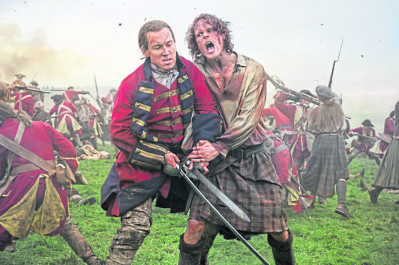 Tobias Menzies as Jack Randall and Sam Heughan as Jamie Fraser in Outlander.