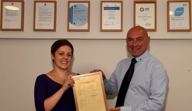 Councillor, Kirsty Blackman presents Brian Sinclair, Monitor Systems Scotland Limited, Aberdeen with their award.