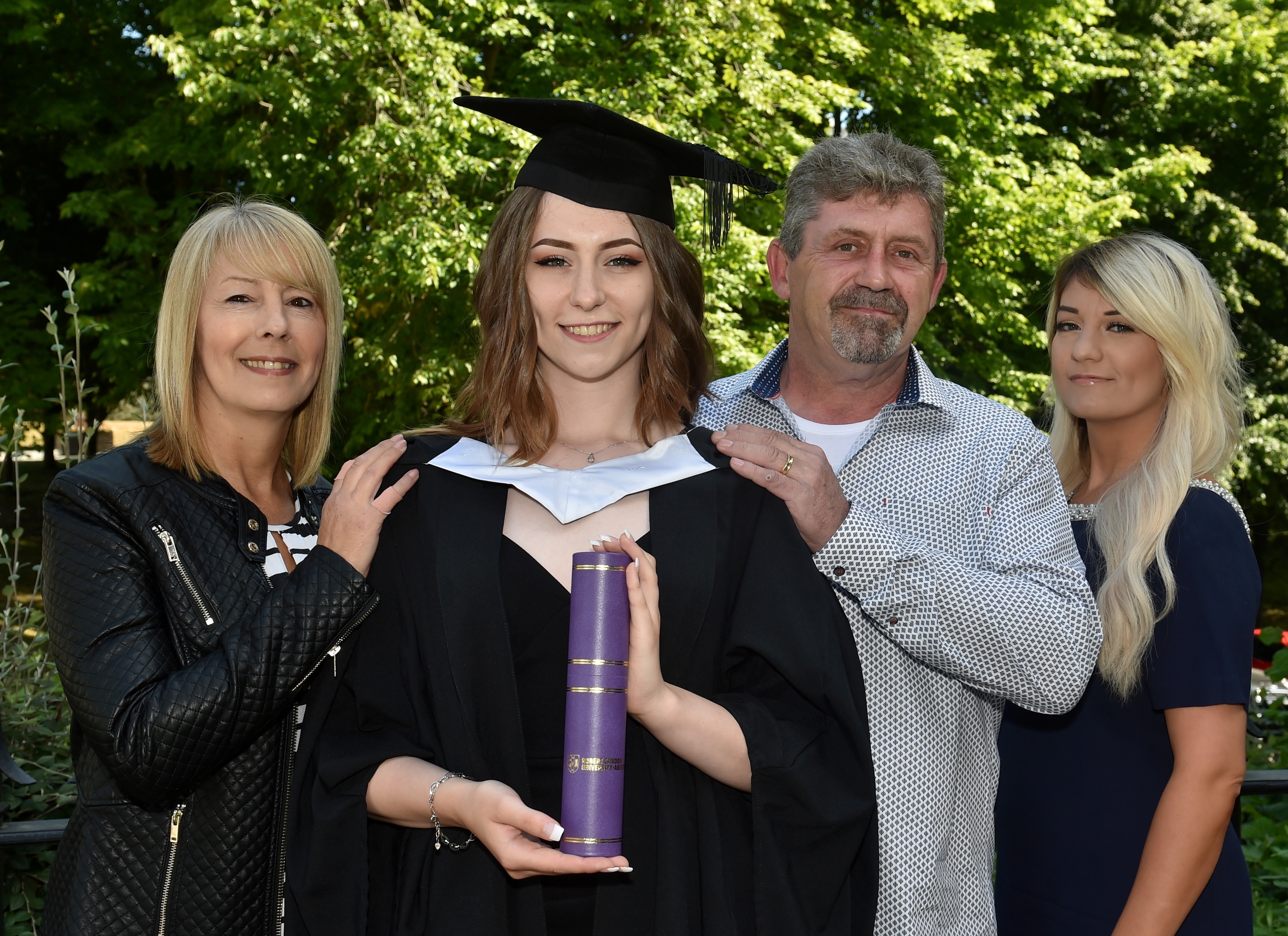 Jade Gilbert BA (hons) Contemporary Art Practice (Aberdeen). She is pictured with mum Sandra, Dad David and sister Zara.
Picture by Colin Rennie.