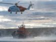 HM Coastguard helicopter and RNLI lifeboat