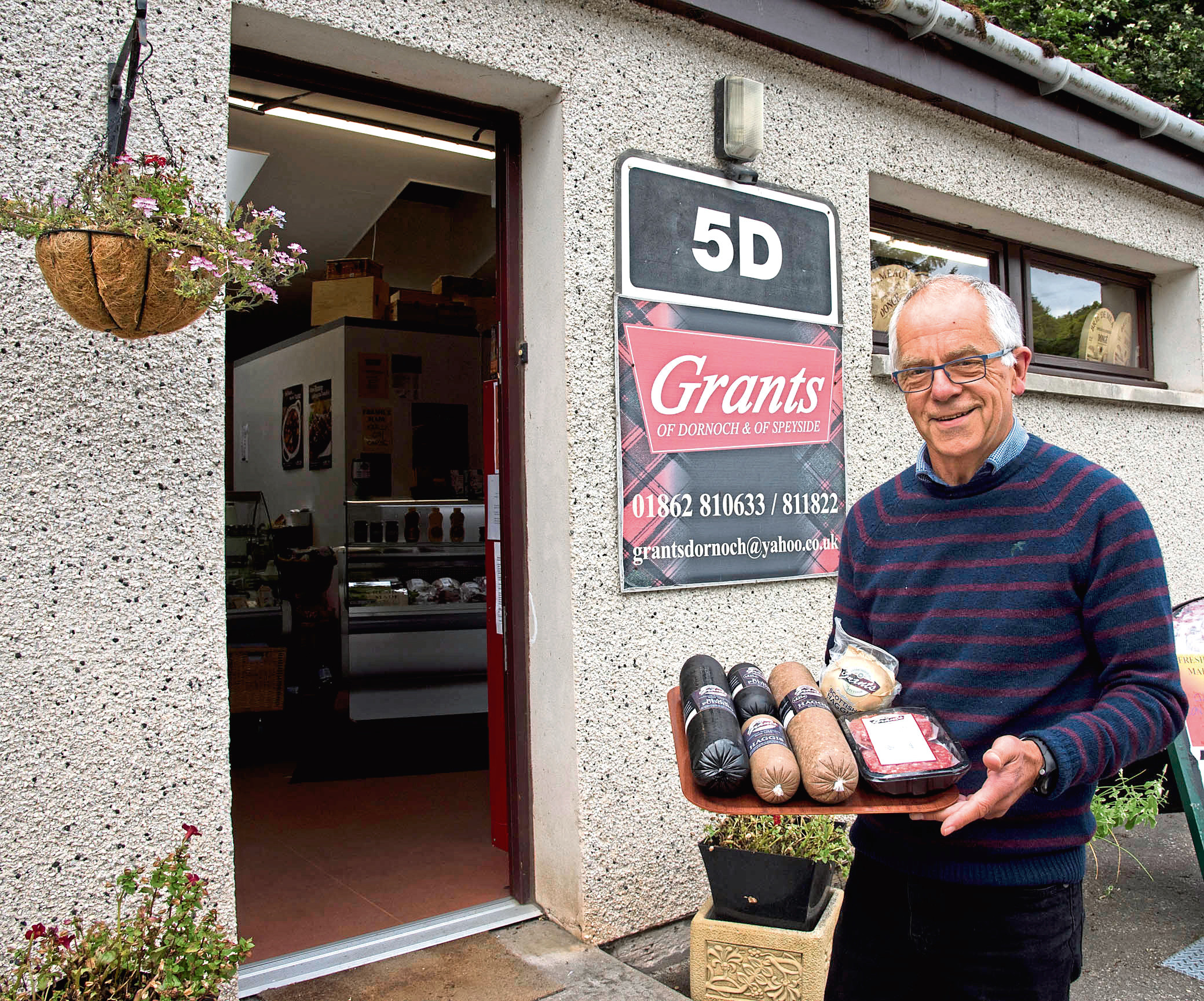 Stuart Grant outside the Grants of Dornoch shop. He has battle back from receivership to make the firm a success.