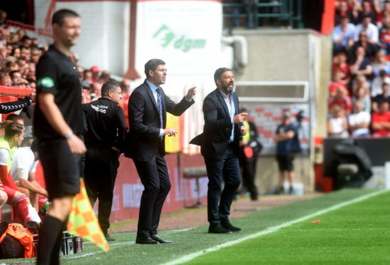 Steven Gerrard felt the world was against Rangers during their 1-1 draw with Aberdeen.