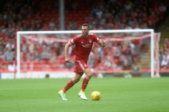 Andrew Considine and his Dons team-mates will travel to Hibs or Ross County in the quarter-final