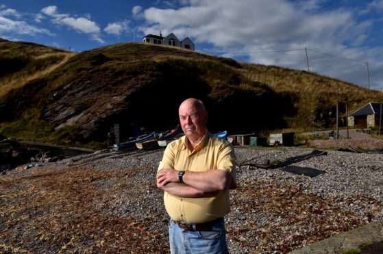 Jim Adam at Cove Harbour