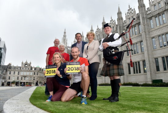 Back: David Steele, Wilma Milne, Douglas Lumsden, Clr Jenny Laing, and Chris Sibbard. Front :Fiona Brian and Kyle Greig. Picture by Scott Baxter.