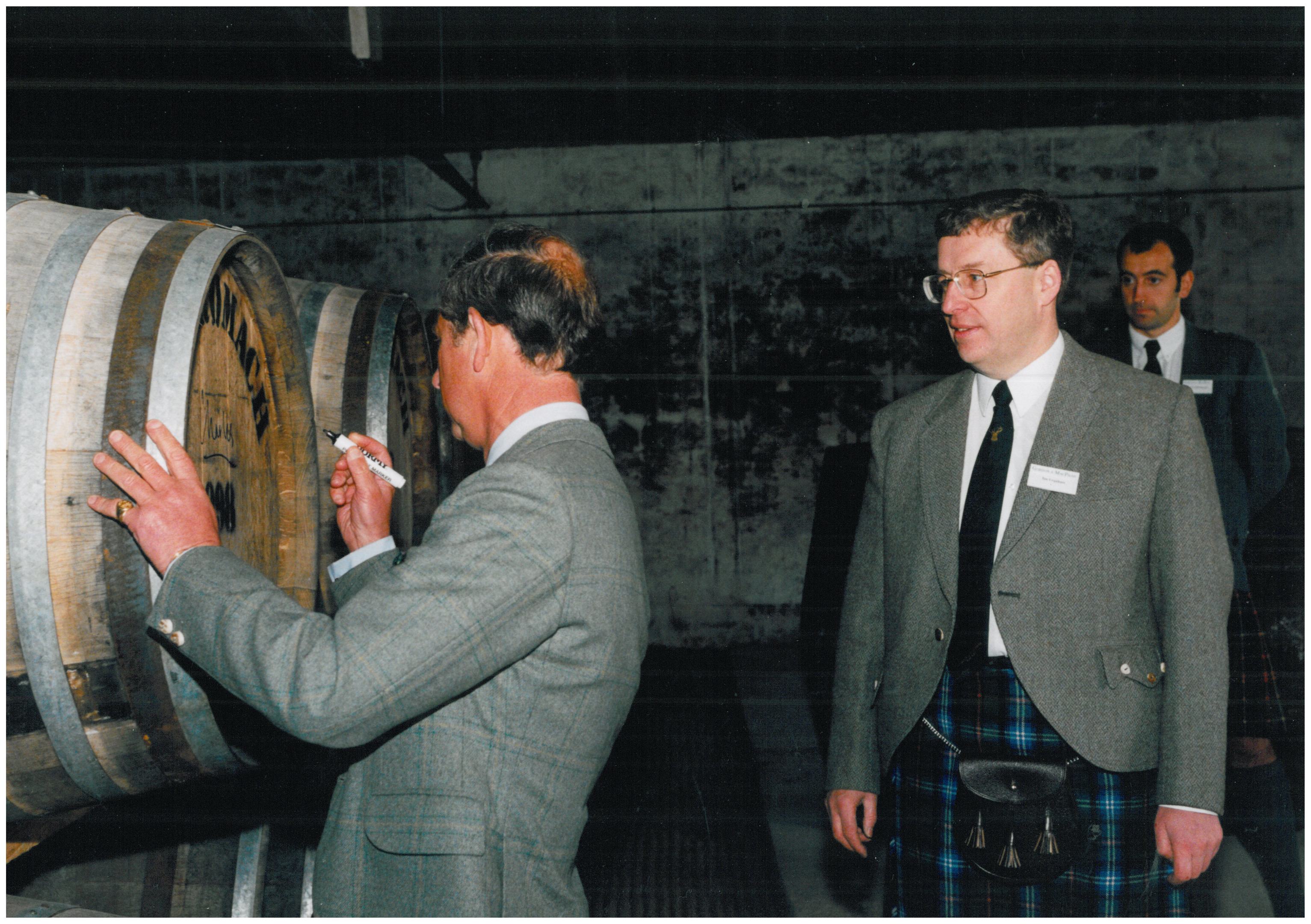 Prince Charles signing the first cask of Benromach whisky at the reopened distillery in 1998