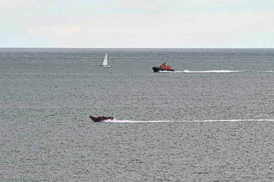 The Macduff and Buckie lifeboats heading for home after the search on August 9 was called off when it was realised the call was a hoax