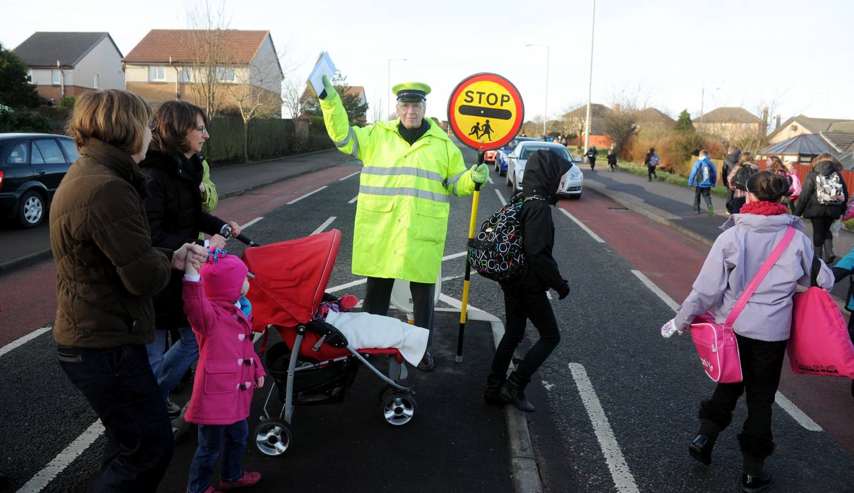 Lollipop man John Ingram celebrates his 80th birthday.