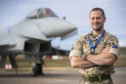 Sgt Innes Manson will attempt to pull a Typhoon jet 100ft.