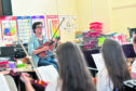 Pictured is Ronnie Gibson who is leading the music workshop.

Picture by Scott Baxter.