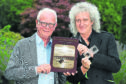 Prof Roger Taylor and Brian May launched a new book about pioneering Aberdeen photographer George Washington Wilson at The University of Aberdeen in 2018. Picture by Kenny Elrick.