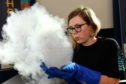 Picture of Akvile Terminaite experimenting with liquid nitrogen. Picture by Kenny Elrick.
