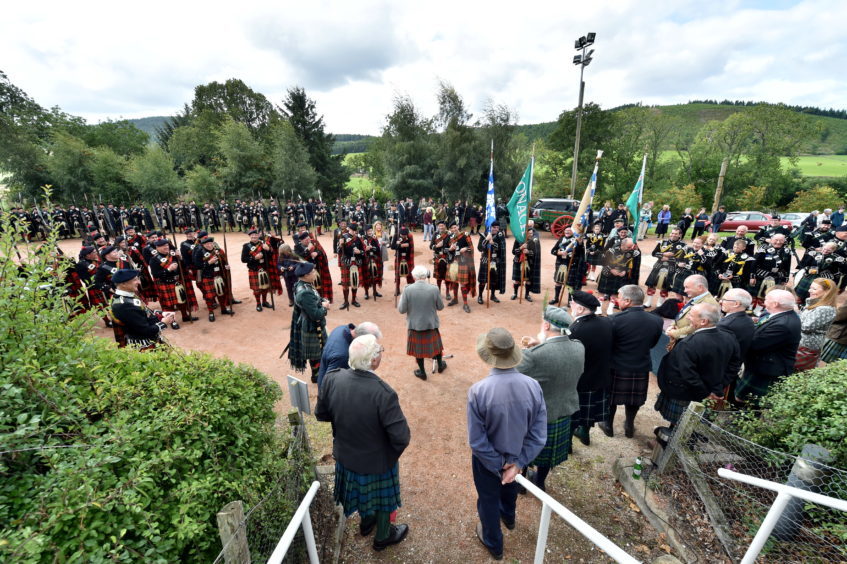 The Lonach Highlanders on their six-mile march.